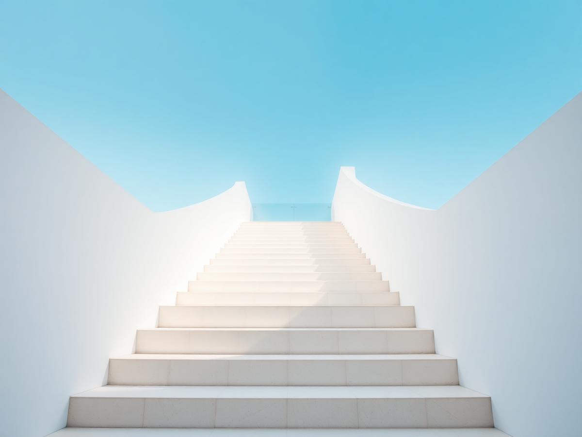 Escalera blanca ascendente bajo cielo abierto